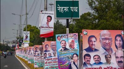 Posters of leaders ahead of the meeting. (PTI) Posters of leaders ahead of the meeting. (PTI)