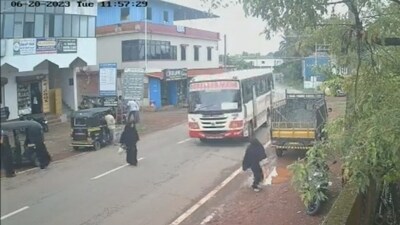 Mangaluru woman's close shave with a private bus, driver booked. (Screengrab from CCTV footage) Mangaluru woman's close shave with a private bus, driver booked. (Screengrab from CCTV footage)