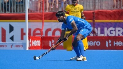 Sumit in action for India. Sumit in action for India.