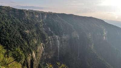 Cherrapunji, India: Known as one of the wettest places on Earth, Cherrapunji in Meghalaya, India, is a monsoon lover's paradise. Its rolling hills, cascading waterfalls, and living root bridges come alive during the monsoon season. Explore the mesmerizing Nohkalikai Falls, experience the thrill of trekking through the dense rainforests, and immerse yourself in the local Khasi culture. (Diptendu Dutta / AFP) Cherrapunji, India: Known as one of the wettest places on Earth, Cherrapunji in Meghalaya, India, is a monsoon lover's paradise. Its rolling hills, cascading waterfalls, and living root bridges come alive during the monsoon season. Explore the mesmerizing Nohkalikai Falls, experience the thrill of trekking through the dense rainforests, and immerse yourself in the local Khasi culture. (Diptendu Dutta / AFP)