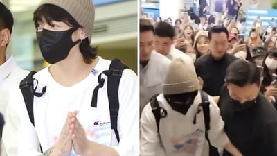 Jungkook tried to help a fan from falling down at the airport recently. Jungkook tried to help a fan from falling down at the airport recently.