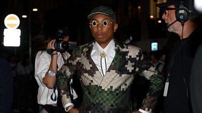 Pharrell's appointment symbolizes more than a career shift. It represents a daring move by the luxury brand to entrust the position to a musical artist and cultural influencer, not a classically trained designer. But Pharrell says he doesn’t feel pressure to prove himself — he was chosen.“I didn’t feel any of that because if I was competing for it and people kept telling me, ‘No don’t do it,’ I may have felt that way. But the difference is, I was chosen,” Pharrell told AP in a joint interview. "So, like when you’re chosen, you just kind of ride the wave.” (AFP) Pharrell's appointment symbolizes more than a career shift. It represents a daring move by the luxury brand to entrust the position to a musical artist and cultural influencer, not a classically trained designer. But Pharrell says he doesn’t feel pressure to prove himself — he was chosen.“I didn’t feel any of that because if I was competing for it and people kept telling me, ‘No don’t do it,’ I may have felt that way. But the difference is, I was chosen,” Pharrell told AP in a joint interview. "So, like when you’re chosen, you just kind of ride the wave.” (AFP)