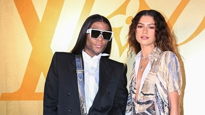 US fashion designer Law Roach (L) and US actress and singer Zendaya Maree Stoermer Coleman pose for a photocall at the Louis Vuitton Menswear Spring-Summer 2024. The pulse of Paris was set alight as Williams unveiled a debut fusing streetwear aesthetics into the French maison’s traditional lineage. The fashion show epitomized high-voltage energy, reverberating through the audience and culminating in a standing ovation for Williams. (AFP) US fashion designer Law Roach (L) and US actress and singer Zendaya Maree Stoermer Coleman pose for a photocall at the Louis Vuitton Menswear Spring-Summer 2024. The pulse of Paris was set alight as Williams unveiled a debut fusing streetwear aesthetics into the French maison’s traditional lineage. The fashion show epitomized high-voltage energy, reverberating through the audience and culminating in a standing ovation for Williams. (AFP)