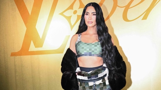 US socialite Kim Kardashian poses for a photocall. Channeling gender-fluid appeal, Williams showcased an exhaustive collection spanning checkerboard-patterned denim to a sophisticated cream evening jacket. The line, marked by photo prints of the Pont Neuf and a uniquely designed coat with a shaved monogram motif, also underscored his flair for distinct aesthetics.&nbsp;(AFP)