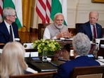 Prime Minister Narendra Modi speaks during a meeting with President Joe Biden and American and Indian business leaders in the East Room of the White House on Friday in Washington. Tim Cook, CEO of Apple, listens. 