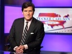 FILE - Tucker Carlson, host of "Tucker Carlson Tonight," poses for photos in a Fox News Channel studio on March 2, 2017, in New York. Fox News sent Carlson a “cease-and-desist” letter over his new Twitter series, Axios reported Monday, June 12, 2023, amid reports of contract battles between the conservative network and its former prime-time host. (AP Photo/Richard Drew, File)