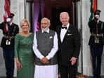 US President Joe Biden and First Lady Jill Biden greet India's Prime Minister Narendra Modi on arrival for a State Dinner. 