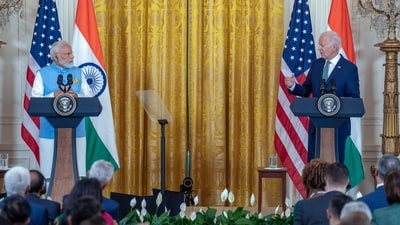 Referring to Kamala Harris, the first Black, South Asian, and woman to be elected to the post of Vice President, PM Modi said, “There are millions here, who have roots in India. Some of them sit proudly in this chamber. There is one behind me, who has made history.” (PIB) Referring to Kamala Harris, the first Black, South Asian, and woman to be elected to the post of Vice President, PM Modi said, “There are millions here, who have roots in India. Some of them sit proudly in this chamber. There is one behind me, who has made history.” (PIB)