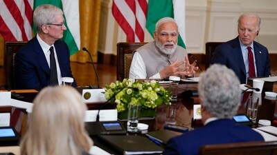 Prime Minister Narendra Modi speaks during a meeting with President Joe Biden and American and Indian business leaders in the East Room of the White House on Friday in Washington. Tim Cook, CEO of Apple, listens. (AP) Prime Minister Narendra Modi speaks during a meeting with President Joe Biden and American and Indian business leaders in the East Room of the White House on Friday in Washington. Tim Cook, CEO of Apple, listens. (AP)