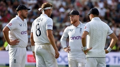Ben Stokes, centre, speaks to Ollie Robinson, left, England's James Anderson, right, and England's Stuart Broad during first Ashes Test (AP) Ben Stokes, centre, speaks to Ollie Robinson, left, England's James Anderson, right, and England's Stuart Broad during first Ashes Test (AP)