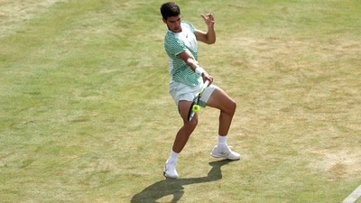 Carlos Alcaraz strikes a forehand to Jiri Lehecka during their Men's singles round of 16 match on day four of the Championships at The Queen's Club (AP) Carlos Alcaraz strikes a forehand to Jiri Lehecka during their Men's singles round of 16 match on day four of the Championships at The Queen's Club (AP)