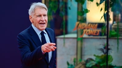US actor Harrison Ford (C) arrives on the red carpet at the German premiere of Lucasfilm's "Indiana Jones and the Dial of Destiny", at the Zoopalast cinema on June 22, 2023 in Berlin. (Photo by John MACDOUGALL / AFP) (AFP) US actor Harrison Ford (C) arrives on the red carpet at the German premiere of Lucasfilm's "Indiana Jones and the Dial of Destiny", at the Zoopalast cinema on June 22, 2023 in Berlin. (Photo by John MACDOUGALL / AFP) (AFP)