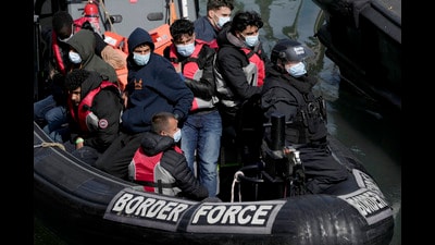 Migrants who undertook the crossing from France to UK in small boats beingg picked up in the English Channel. ((AP Photo/Matt Dunham, File)) Migrants who undertook the crossing from France to UK in small boats beingg picked up in the English Channel. ((AP Photo/Matt Dunham, File))