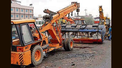 Police removing the oil tanker from the road in Ludhiana on Friday. (HT Photo) Police removing the oil tanker from the road in Ludhiana on Friday. (HT Photo)