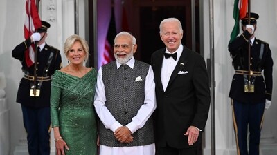 US President Joe Biden and First Lady Jill Biden greet India's Prime Minister Narendra Modi on arrival for a State Dinner. (AFP) US President Joe Biden and First Lady Jill Biden greet India's Prime Minister Narendra Modi on arrival for a State Dinner. (AFP)