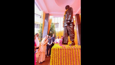 Uttar Pradesh Chief Minister Yogi Adityanath pays tribute to Shyama Prasad Mukherjee on his death anniversary, in Lucknow, Friday. (PTI)