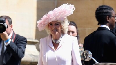 Queen Camilla wearing the pink Anna Valentine dress at Meghan and Harry’s royal wedding in May 2018. (Getty Images) Queen Camilla wearing the pink Anna Valentine dress at Meghan and Harry’s royal wedding in May 2018. (Getty Images)