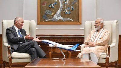 Prime Minister Narendra Modi (L) with Boeing CEO Dave Calhoun. Prime Minister Narendra Modi (L) with Boeing CEO Dave Calhoun.
