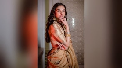 Aditi kept her makeup minimal with mascara-coated lashes, contoured cheeks, and a nude lipstick. Her curly tresses were left open, beautifully cascading down her shoulders, adding to her overall look. (Instagram/@sanamratansi ) Aditi kept her makeup minimal with mascara-coated lashes, contoured cheeks, and a nude lipstick. Her curly tresses were left open, beautifully cascading down her shoulders, adding to her overall look. (Instagram/@sanamratansi )