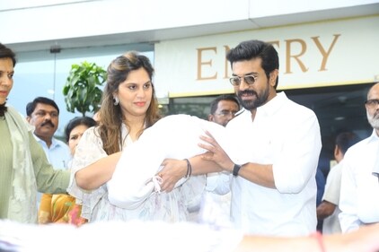 Upasana Konidela and Ram Charan pose outside the hospital. Upasana Konidela and Ram Charan pose outside the hospital.