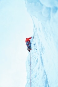 Conquer the frozen heights of the Canadian Rockies through exhilarating ice climbing, pushing your limits amidst stunning icy landscapes. (Greg Rakozy on Unsplash) Conquer the frozen heights of the Canadian Rockies through exhilarating ice climbing, pushing your limits amidst stunning icy landscapes. (Greg Rakozy on Unsplash)