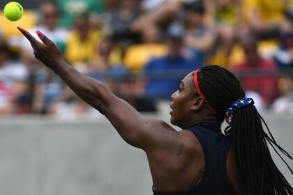 USA's Serena Williams serves to Australia's Daria Gavrilova during their women's first round singles tennis match at the Olympic Tennis Centre in Rio de Janeiro on Sunday. (AFP)