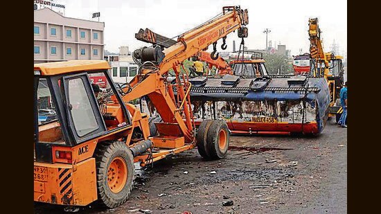 Police removing the oil tanker from the road in Ludhiana on Friday. (HT Photo)