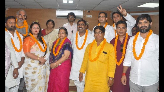The 12 Executive members won the election unopposed in the executive hall of Ghaziabad Municipal Corporation in Ghaziabad , India on Friday. (Sakib Ali/HT Photo)