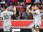 Kylian Mbappe celebrates with Neymar and Lionel Messi after scoring during a Ligue 1 match. Kylian Mbappe celebrates with Neymar and Lionel Messi after scoring during a Ligue 1 match.