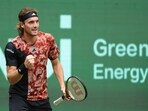 Stefanos Tsitsipas from Greece reacts during his first round tennis match against Gregoire Barrere from France at the Halle ATP Tour tennis tournament in Halle, Germany, Monday, June 19, 2023. (Friso Gentsch/dpa via AP)