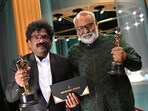 Lyricist Chanrabose and Indian musical composer M.M. Keeravaani hold the Oscar for Best Music (Original Song) for their song Naatu Naatu in RRR. Lyricist Chanrabose and Indian musical composer M.M. Keeravaani hold the Oscar for Best Music (Original Song) for their song Naatu Naatu in RRR.
