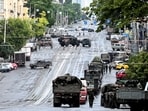 Fighters of Wagner private mercenary group are deployed in a street near the headquarters of the Southern Military District in the city of Rostov-on-Don, Russia. The group is headed towards Moscow and has already claimed control of two key Russian cities.(REUTERS)