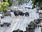 Fighters of Wagner private mercenary group are deployed in a street near the headquarters of the Southern Military District in the city of Rostov-on-Don, Russia.