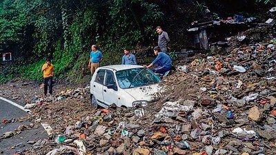 Heavy rainfall blocked several roads, including a highway, near Theog in Shimla on Saturday. (PTI)