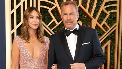 Kevin Costner with estranged wife Christine (Twitter) Kevin Costner with estranged wife Christine (Twitter)