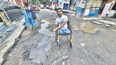 Mumbai, India - June, 24, 2023: Activist Shivkumar gaikar , Under the road in Police beat chowki hariyali village vikhroli no 3 mumbai , the pipeline has burst and the road has been damage and there are potholes on the road,in mumbai, in Mumbai, India, on,Saturday, June, 24, 2023. ( Praful Gangurde / HT Photo ) Mumbai, India - June, 24, 2023: Activist Shivkumar gaikar , Under the road in Police beat chowki hariyali village vikhroli no 3 mumbai , the pipeline has burst and the road has been damage and there are potholes on the road,in mumbai, in Mumbai, India, on,Saturday, June, 24, 2023. ( Praful Gangurde / HT Photo )