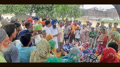 Residents of Dhandari Kalan village stage protest on Saturday. (HT PHOTO) Residents of Dhandari Kalan village stage protest on Saturday. (HT PHOTO)