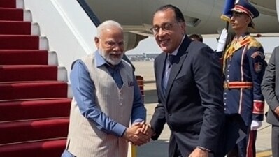 Prime Minister Narendra Modi received by his counterpart on his arrival in Cairo on Saturday. Prime Minister Narendra Modi received by his counterpart on his arrival in Cairo on Saturday.