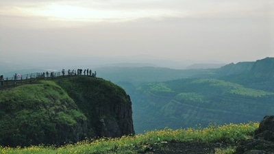 Lonavala, Maharashtra: Escape to Lonavala's misty mountains and breathtaking valleys, where the monsoon showers add a touch of magic. Enjoy leisurely walks amidst the scenic landscapes, visit the iconic waterfalls, and savor delicious local delicacies while reveling in the company of your loved one. (Unsplash) Lonavala, Maharashtra: Escape to Lonavala's misty mountains and breathtaking valleys, where the monsoon showers add a touch of magic. Enjoy leisurely walks amidst the scenic landscapes, visit the iconic waterfalls, and savor delicious local delicacies while reveling in the company of your loved one. (Unsplash)