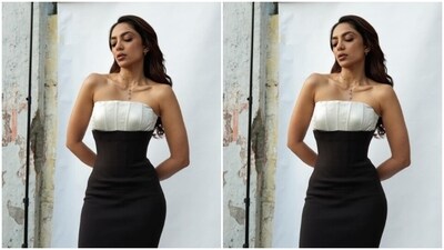 Sobhita decked up in an off-shoulder gown featuring corset details in shades of white, and then cascading to a satin black sleek skirt with a black tulle train. (Instagram/@sobhitad) Sobhita decked up in an off-shoulder gown featuring corset details in shades of white, and then cascading to a satin black sleek skirt with a black tulle train. (Instagram/@sobhitad)