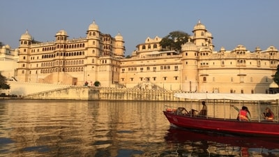 Udaipur, Rajasthan: Embrace the monsoon charm of the "City of Lakes" as raindrops dance on the serene waters of Lake Pichola. Take a romantic boat ride, explore the majestic palaces, and witness the ethereal beauty of Udaipur's monsoon landscapes that are sure to leave you spellbound. (Unsplash) Udaipur, Rajasthan: Embrace the monsoon charm of the "City of Lakes" as raindrops dance on the serene waters of Lake Pichola. Take a romantic boat ride, explore the majestic palaces, and witness the ethereal beauty of Udaipur's monsoon landscapes that are sure to leave you spellbound. (Unsplash)