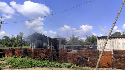 Burnt remains of the godown of Manipur PHED Minister L Sushildro Meitei after it was set ablaze by a mob on Saturday. (PTI) Burnt remains of the godown of Manipur PHED Minister L Sushildro Meitei after it was set ablaze by a mob on Saturday. (PTI)