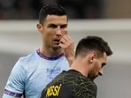 Cristiano Ronaldo and Lionel Messi during an exhibition match.