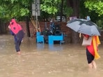 Several parts of Haryana's Gurugram reeled under waterlogged roads. Several parts of Haryana's Gurugram reeled under waterlogged roads.