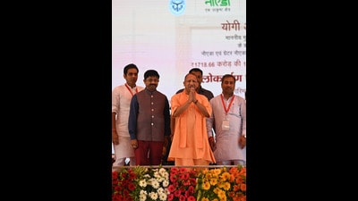 CM Yogi Adityanath addresses party workers at the Noida Stadium on Sunday, before inaugurating multiple projects. (Sunil Ghosh/HT Photo) CM Yogi Adityanath addresses party workers at the Noida Stadium on Sunday, before inaugurating multiple projects. (Sunil Ghosh/HT Photo)