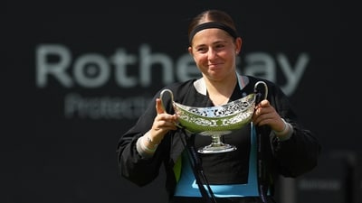 Latvia's Jelena Ostapenko celebrates with the trophy after winning her final match against Czech Republic's Barbora Krejcikova (REUTERS)