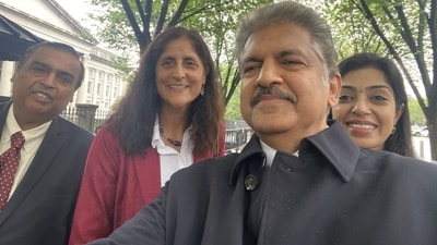 Anand Mahindra clicking a selfie with Mukesh Ambani (left), Sunita Williams and Vrinda Kapoor (right). (Twitter/@anandmahindra) Anand Mahindra clicking a selfie with Mukesh Ambani (left), Sunita Williams and Vrinda Kapoor (right). (Twitter/@anandmahindra)