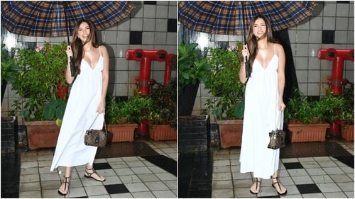 Tara Sutaria stuns in a white midi dress on a rainy day in Mumbai. (HT PHOTO/Varinder Chawla)
