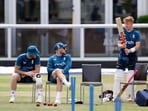 England's Ben Stokes, head coach Brendon McCullum and Ollie Pope during practice