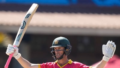 Zimbabwean batsman Sean Williams celebrates after scoring 150 runs during their ICC Men's Cricket World Cup Qualifier match against the US (AP)